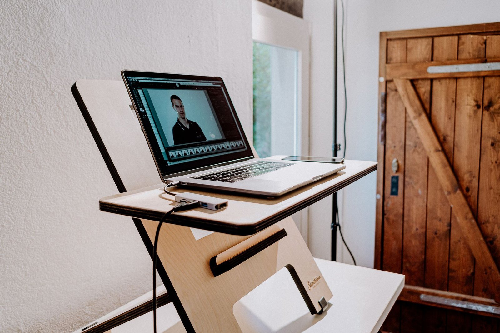 Adjustable desk setup with dual monitors aligned at eye level.