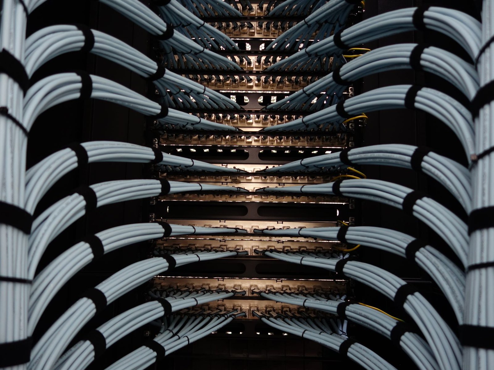 An impeccably organized server rack with clean cables.