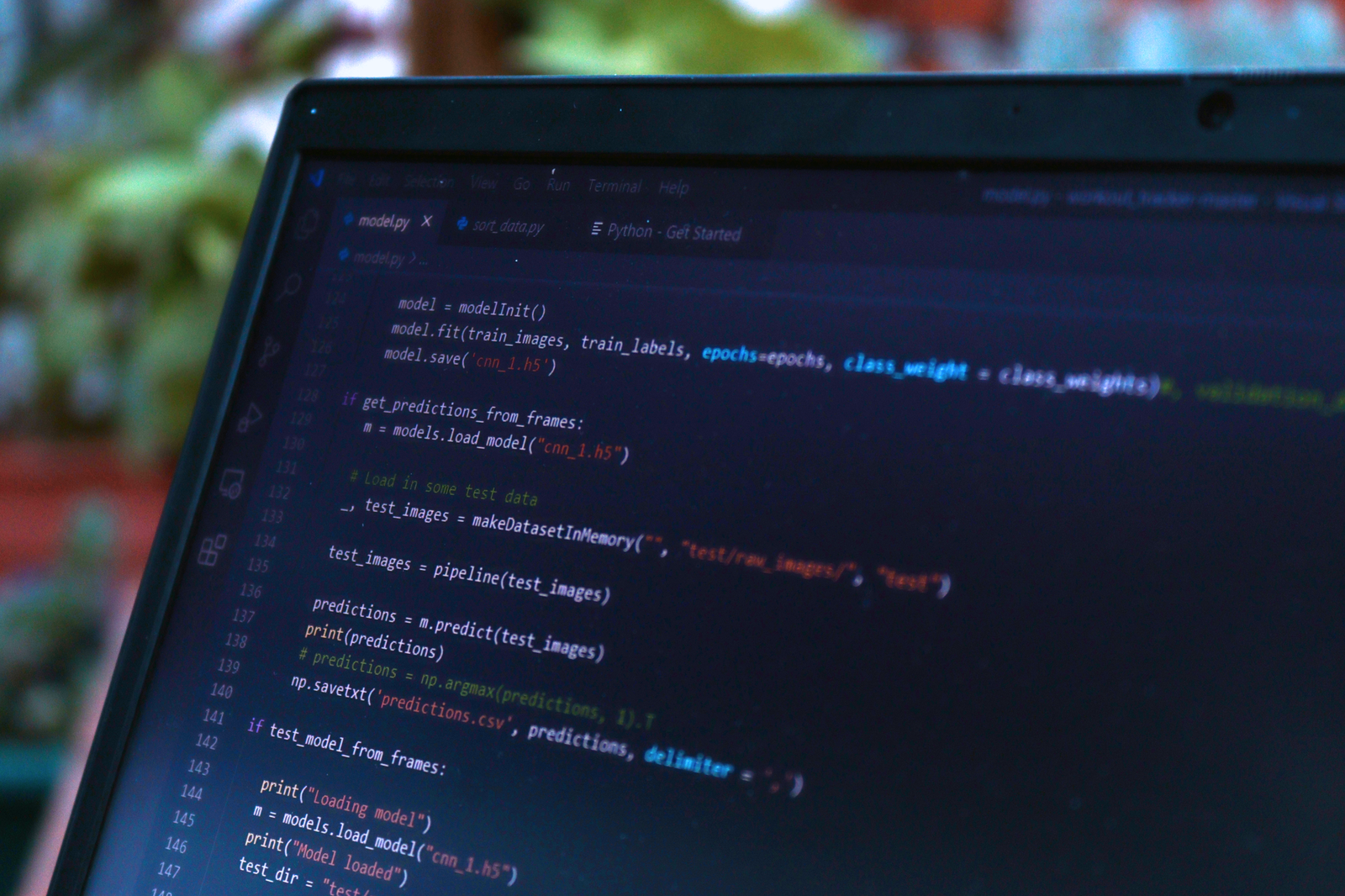 Code editor displaying automated scripts next to smart home devices.