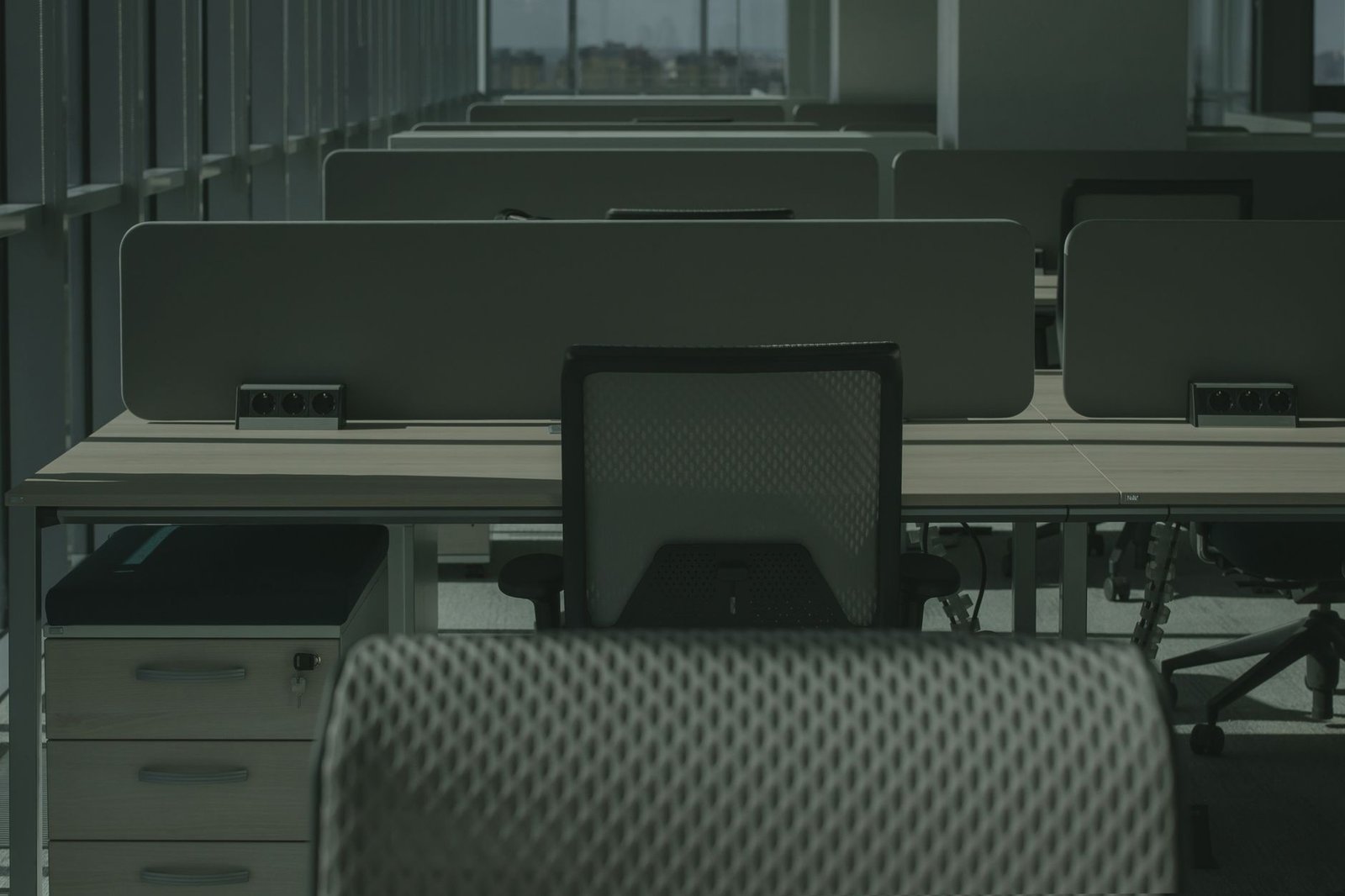 Clean desk setup with a dual monitor display and minimal accessories.
