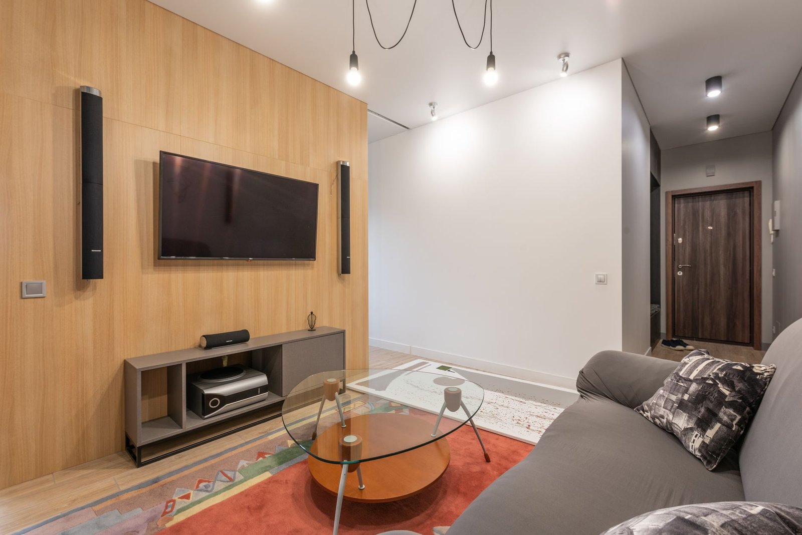 Media center setup powered through energy-monitoring smart plugs.