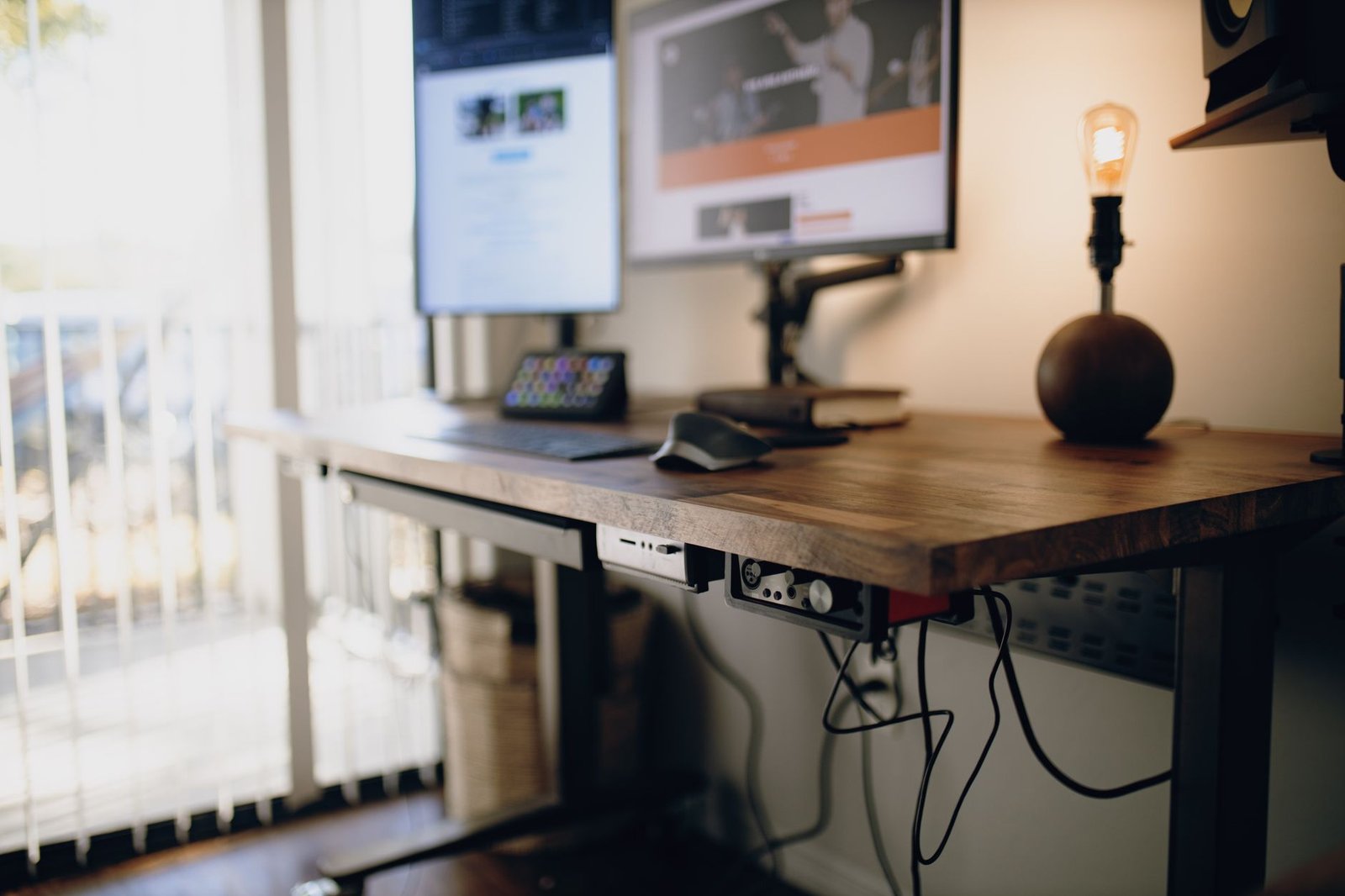 Clean minimalist desk setup with organized cables and a tidy workspace.
