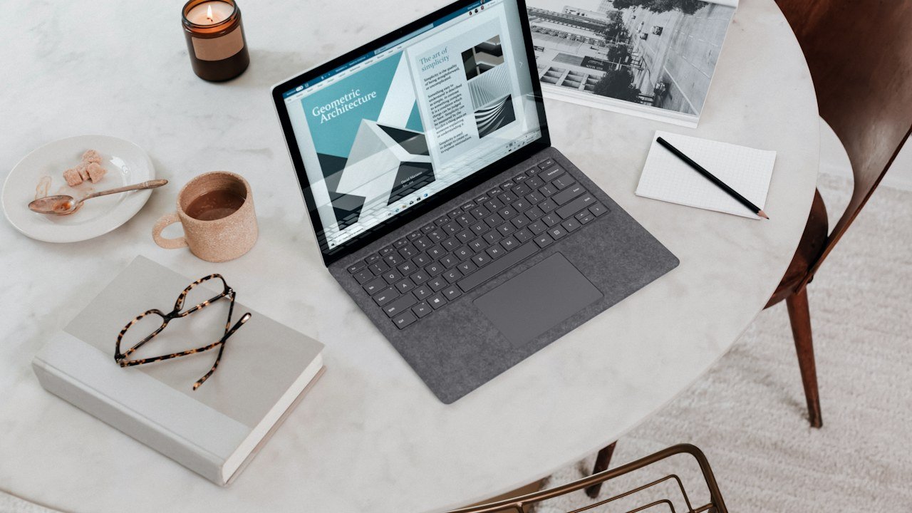 A clean Windows 11 desktop with FancyZones showing custom snap layouts.