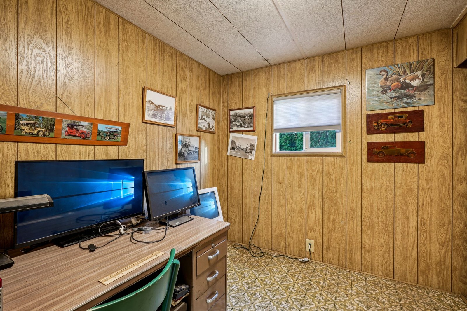 Cozy home office with warm lighting and a quiet atmosphere.